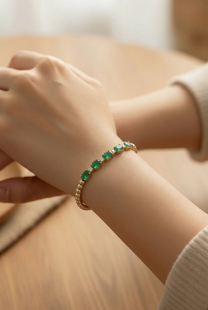 18kt Yellow Gold Diamond And Green Emerald Bracelet