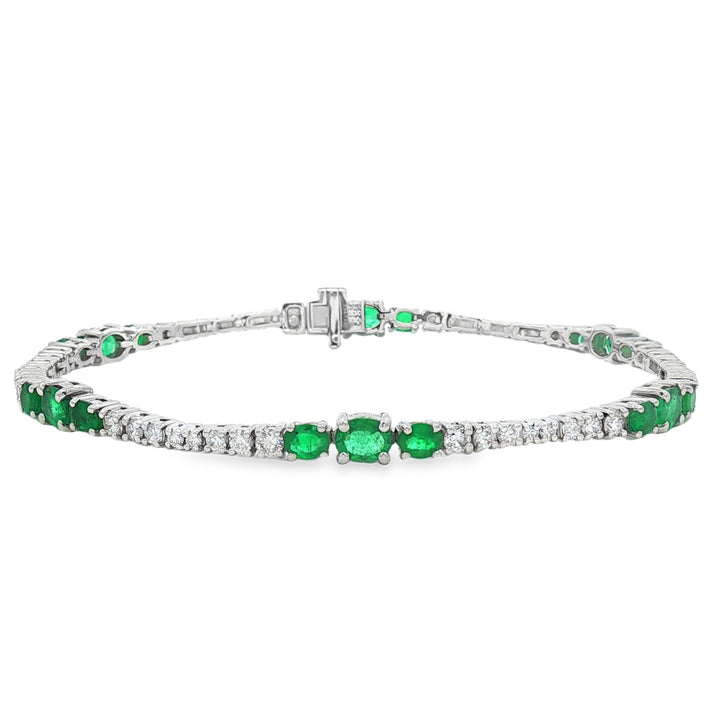 18kt White Gold Diamond And Green Emerald Tennis Bracelet