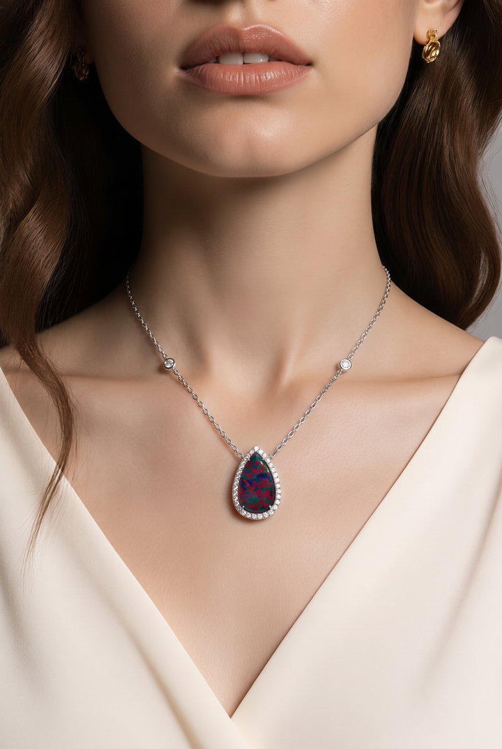 18kt White Gold Diamond And Opal Pendant