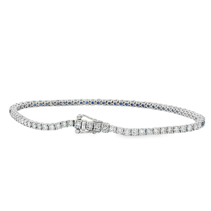 18kt White Gold Diamond And Blue Sapphire Tennis Bracelet