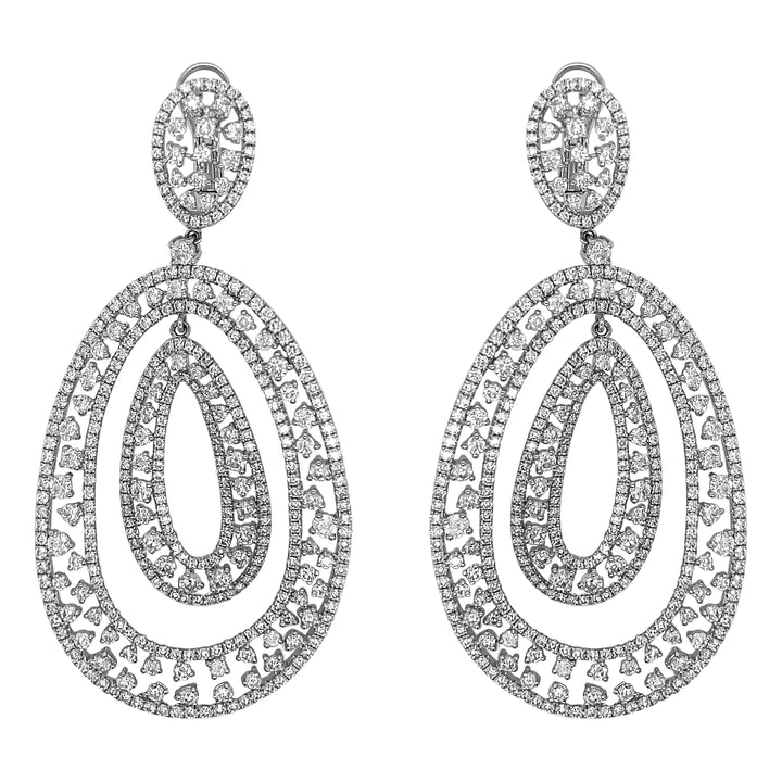 18kt White Gold Diamond Dangling Earrings.
