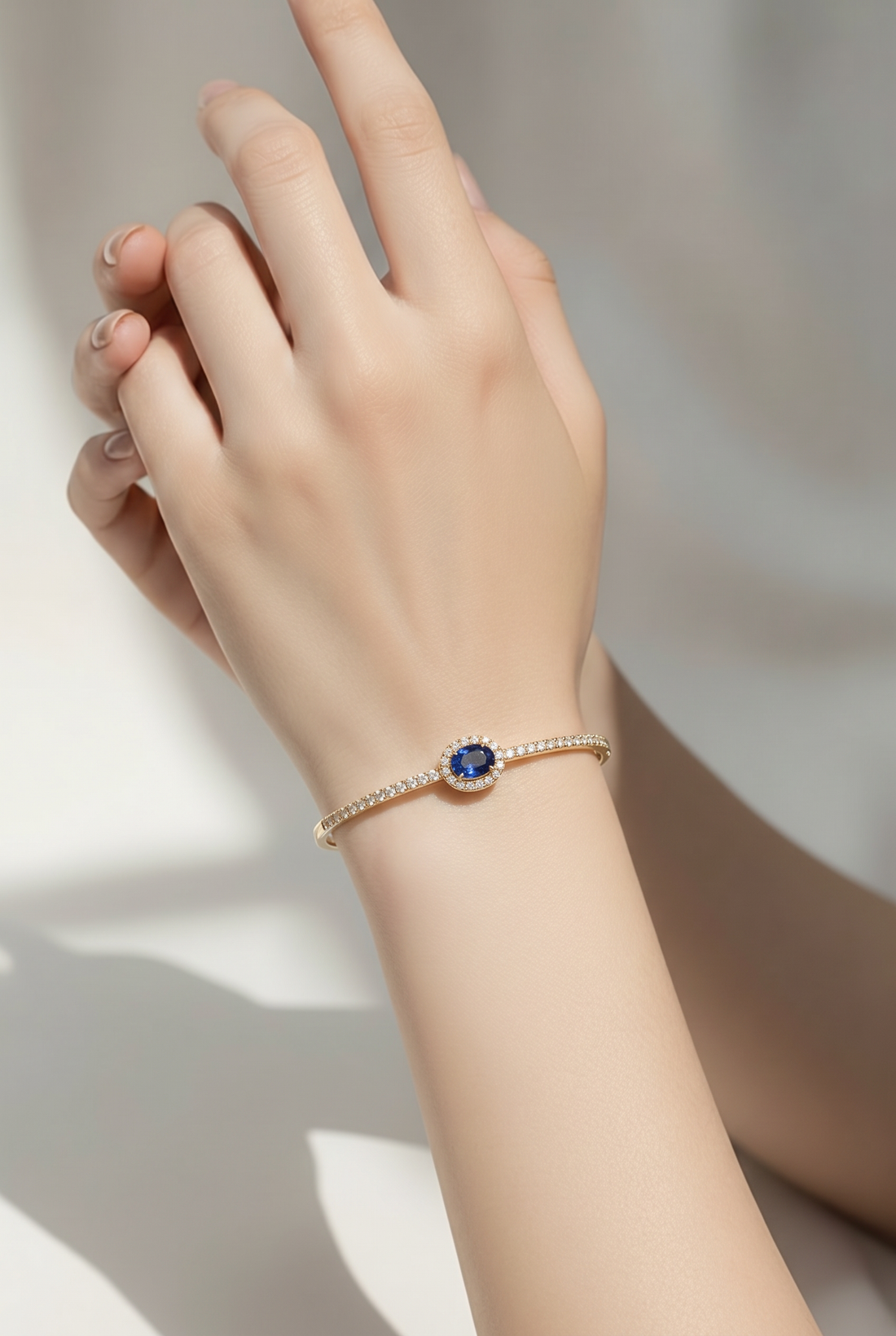 18kt Yellow Gold Diamond And Blue Sapphire Bangle